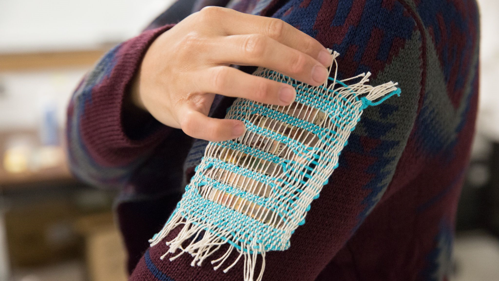 Scientists have created a solar-powered fabric that would let you charge your phone with your jacket